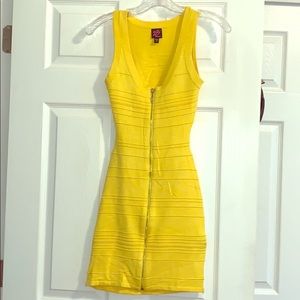 A Yellow Dress with gold zipper. *Never been worn*